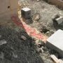 Passage d'une gaine pour la future pompe du puisard extérieur