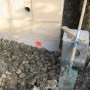 Le coin avec le regard d'arrivée du drain périphérique