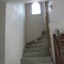 Vous êtes en bas de l'escalier qui monte dans la tour