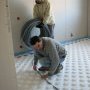Premier déroulage du tube dans la chambre du RDC