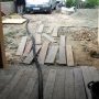 L'entrée du tuyau par le garage